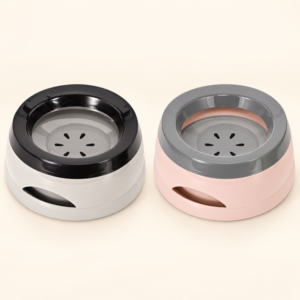 Gray and pink PawSpa travel water bowls side by side